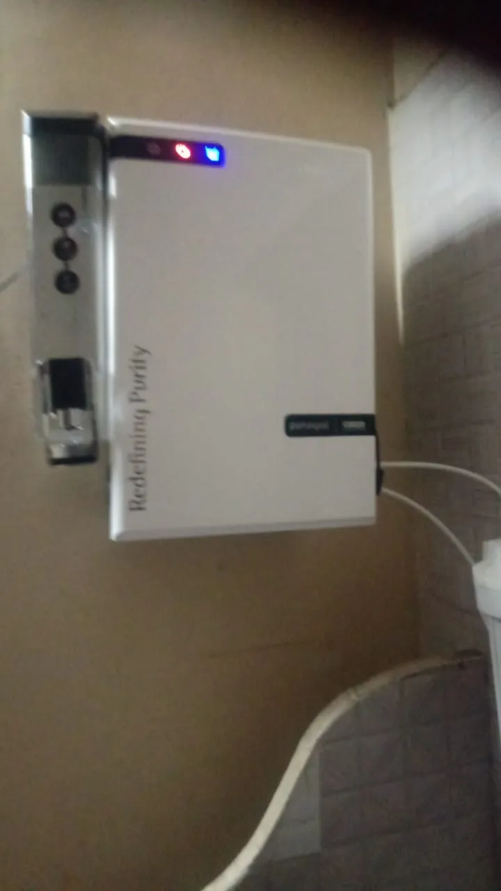 Wall-mounted RO+UV purifier, installed and running